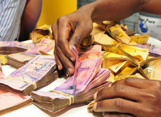 What causes the January financial tension in Uganda?